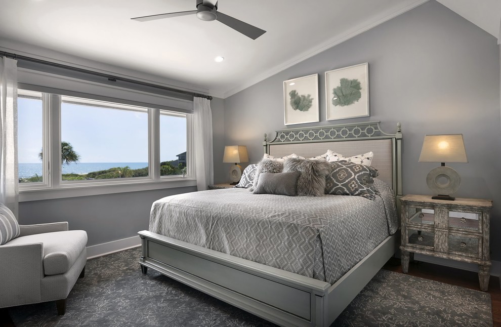 Bedroom - contemporary master medium tone wood floor bedroom idea in Charleston with gray walls and no fireplace