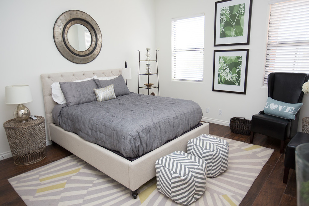 Inspiration for a mid-sized eclectic guest dark wood floor bedroom remodel in Phoenix with white walls