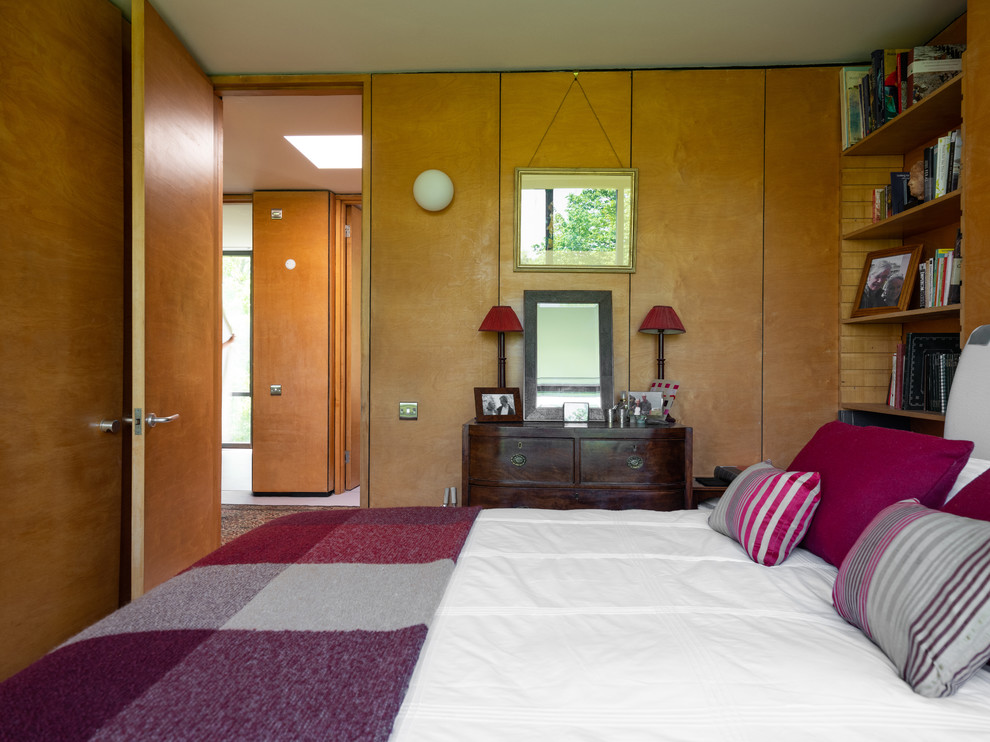 Inspiration for a midcentury bedroom in London.