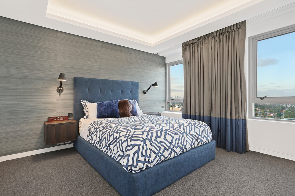 Example of a large trendy guest carpeted bedroom design in Sydney with white walls