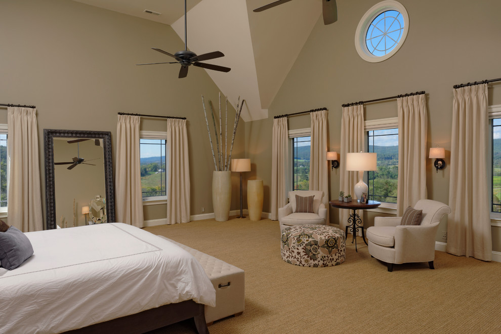 Example of a large classic master carpeted bedroom design in DC Metro with beige walls
