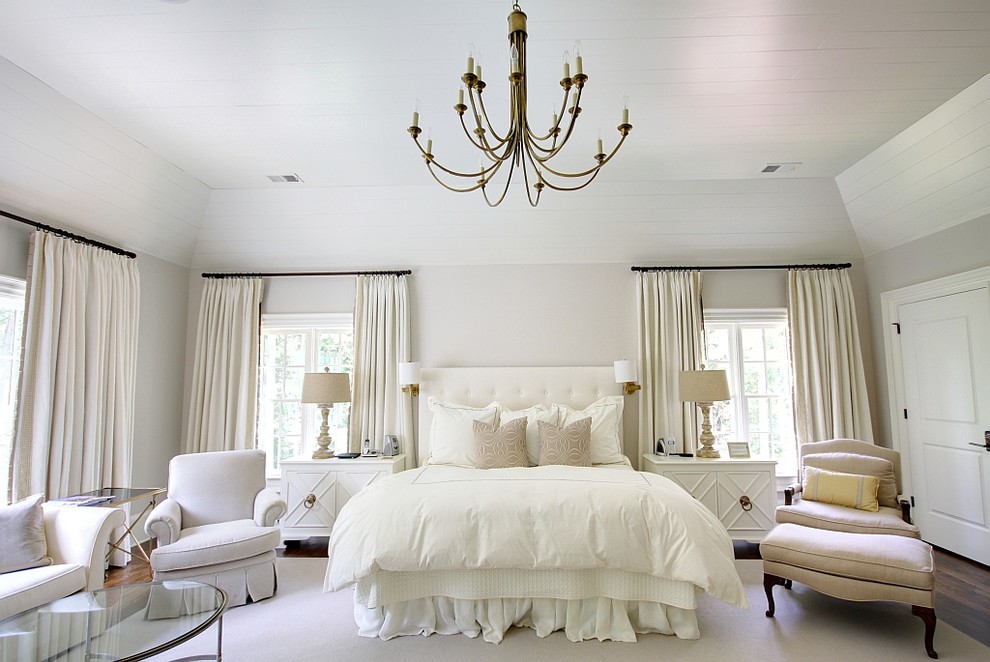 Elegant dark wood floor bedroom photo in Atlanta with beige walls