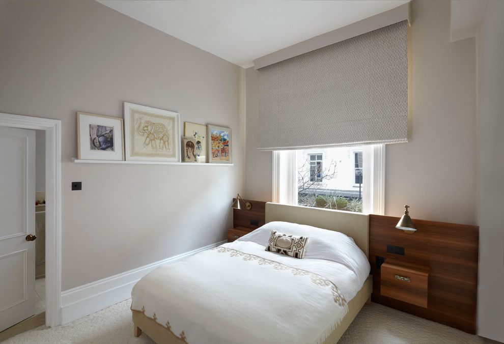 Inspiration for a modern bedroom remodel in London with gray walls