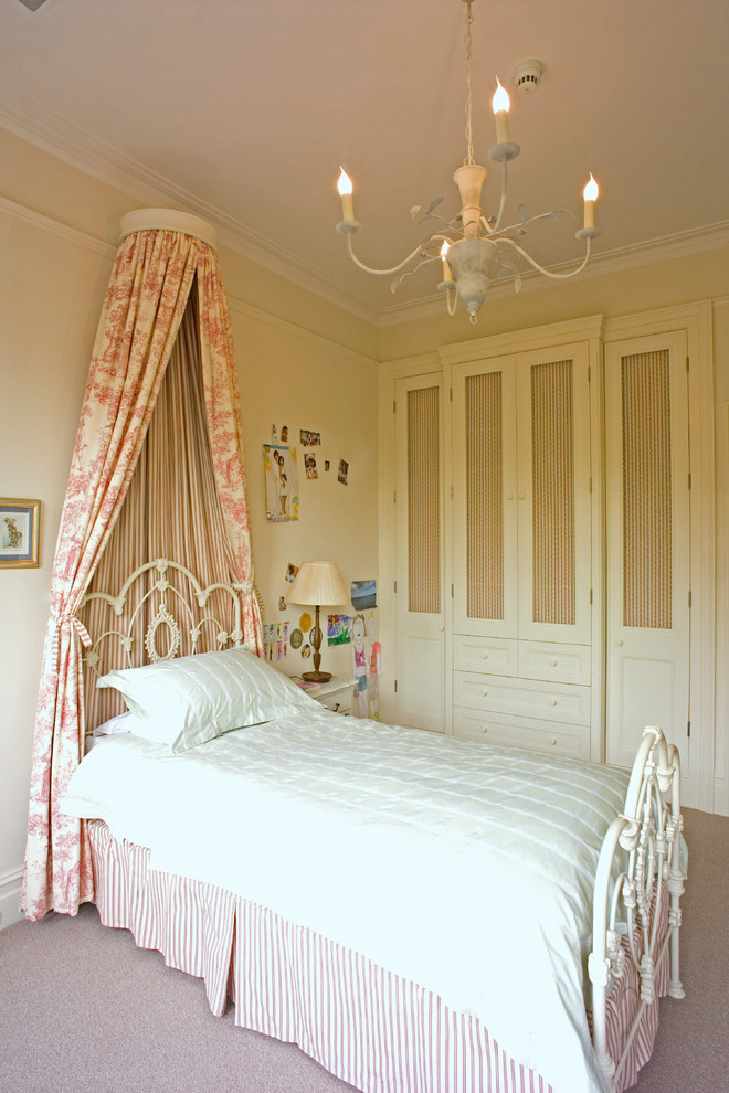 Design ideas for a shabby-chic style bedroom in London.