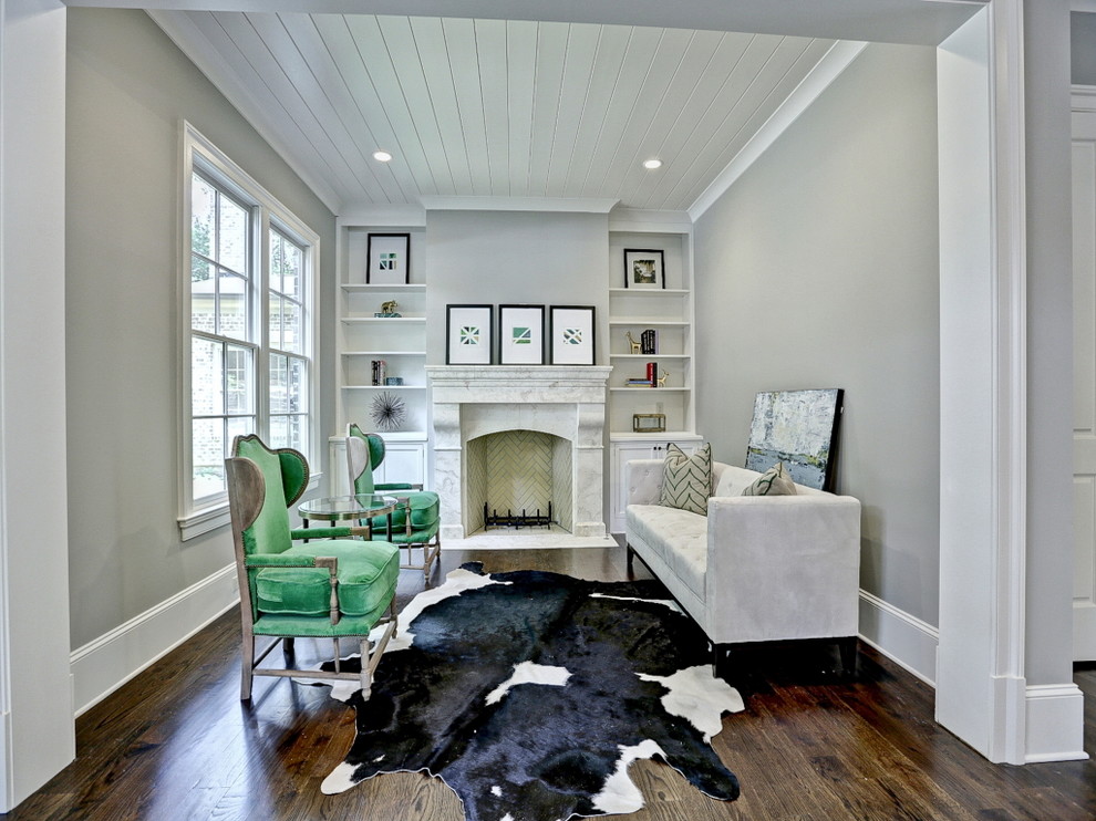 Design ideas for a master bedroom in Atlanta with grey walls and medium hardwood flooring.