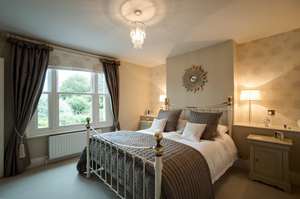 Inspiration for a medium sized contemporary master bedroom in Hertfordshire with carpet, no fireplace and beige floors.
