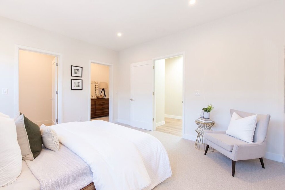 Photo of a medium sized classic master bedroom in San Francisco with beige walls, carpet, no fireplace and beige floors.