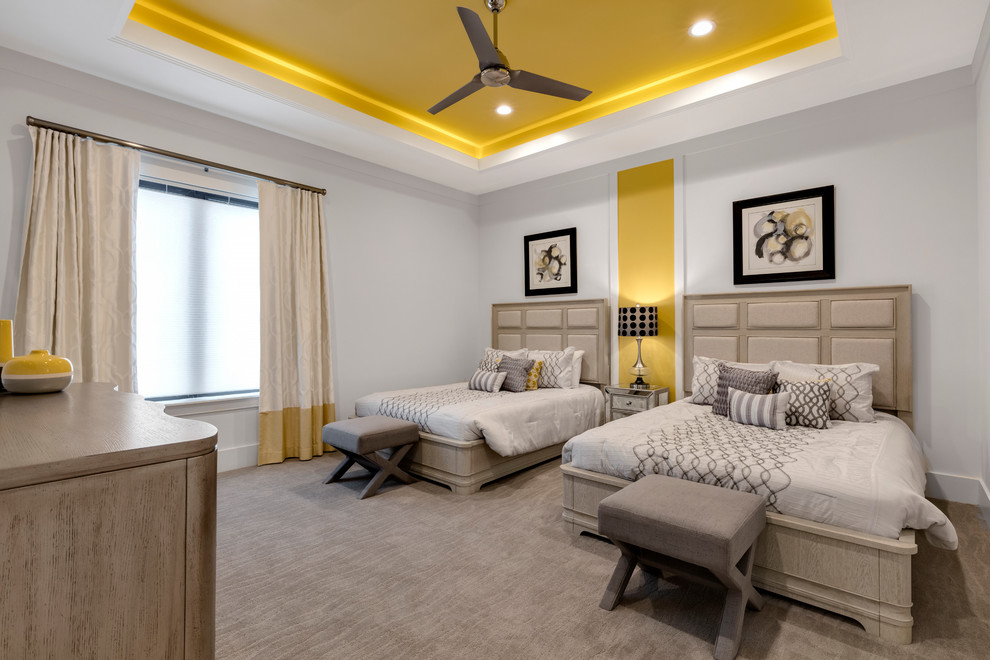This is an example of a large modern guest bedroom in Orlando with yellow walls, carpet and no fireplace.