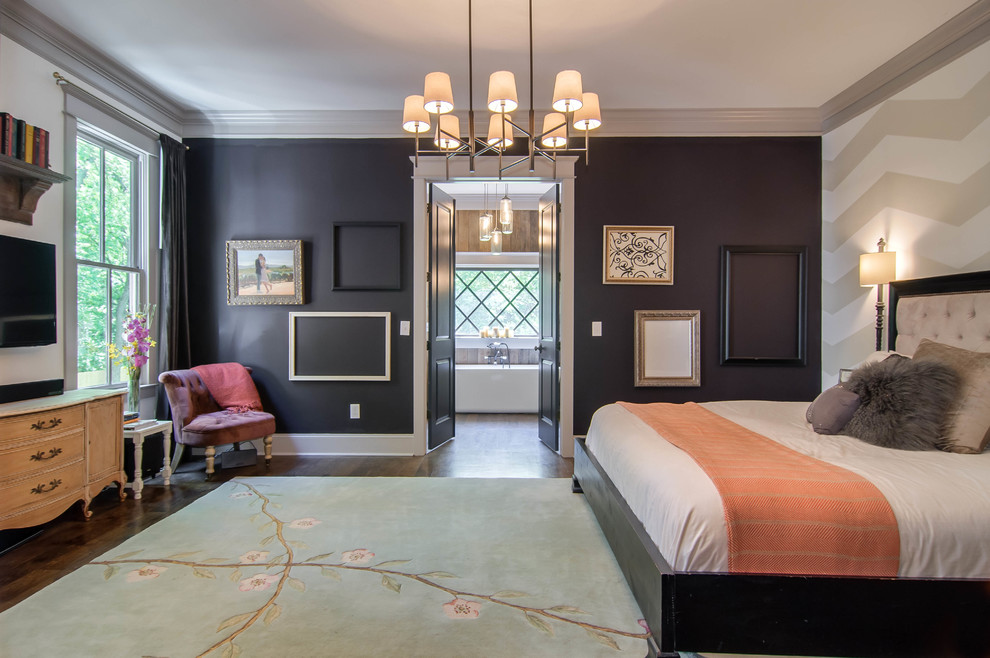 This is an example of a traditional bedroom in Nashville with white walls and a feature wall.