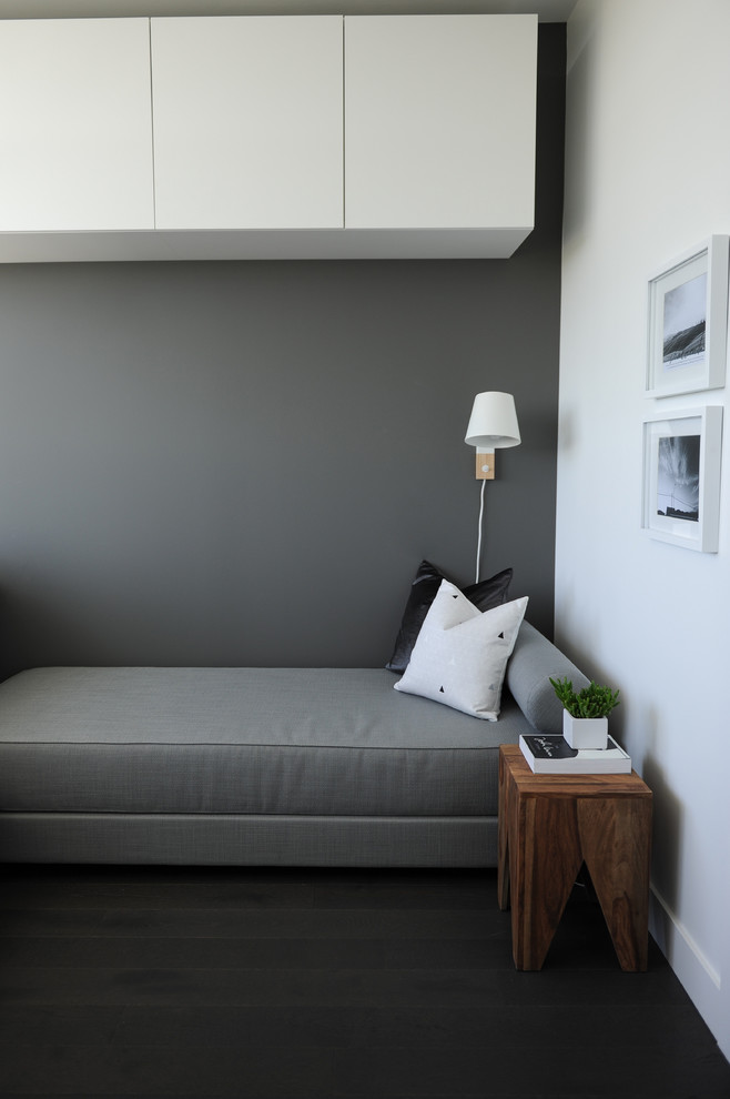 This is an example of a small contemporary guest bedroom in Vancouver with white walls.