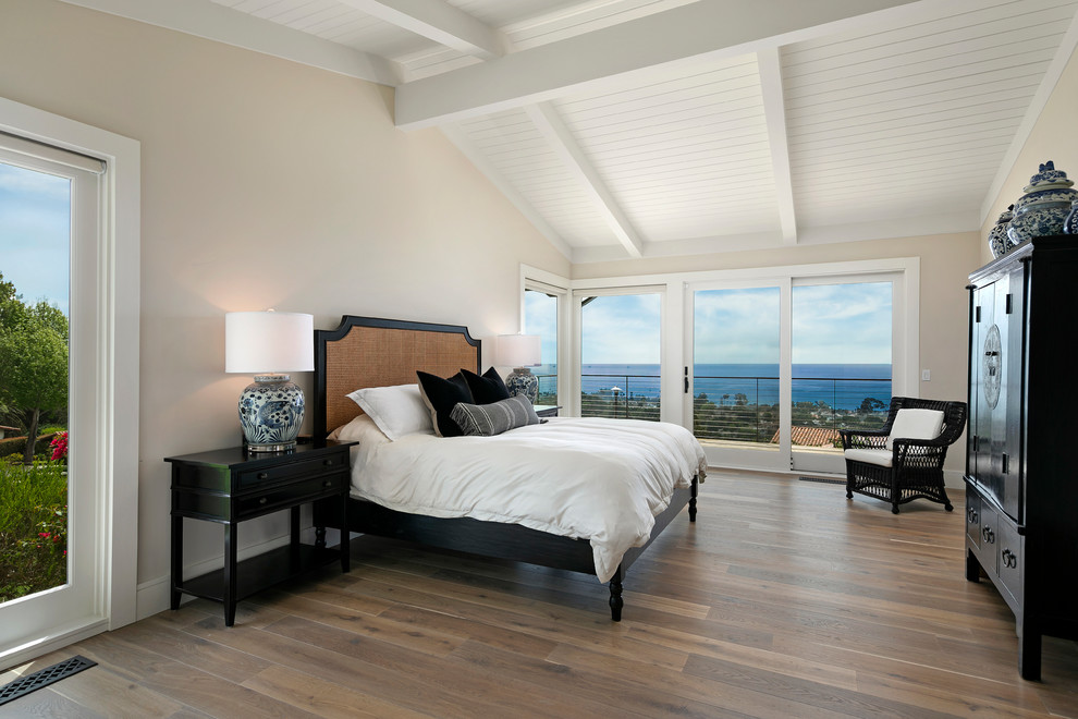Inspiration for a mid-sized transitional guest dark wood floor and brown floor bedroom remodel in Santa Barbara with beige walls