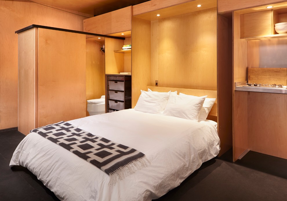 Foto di una piccola camera da letto stile loft industriale
