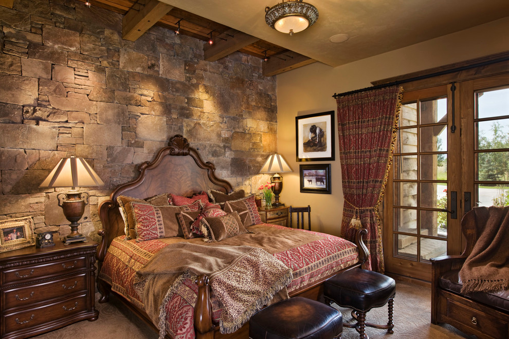 Example of a mountain style carpeted bedroom design in Other with beige walls
