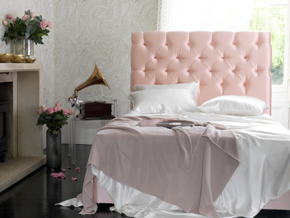 Design ideas for a contemporary grey and pink bedroom in London.