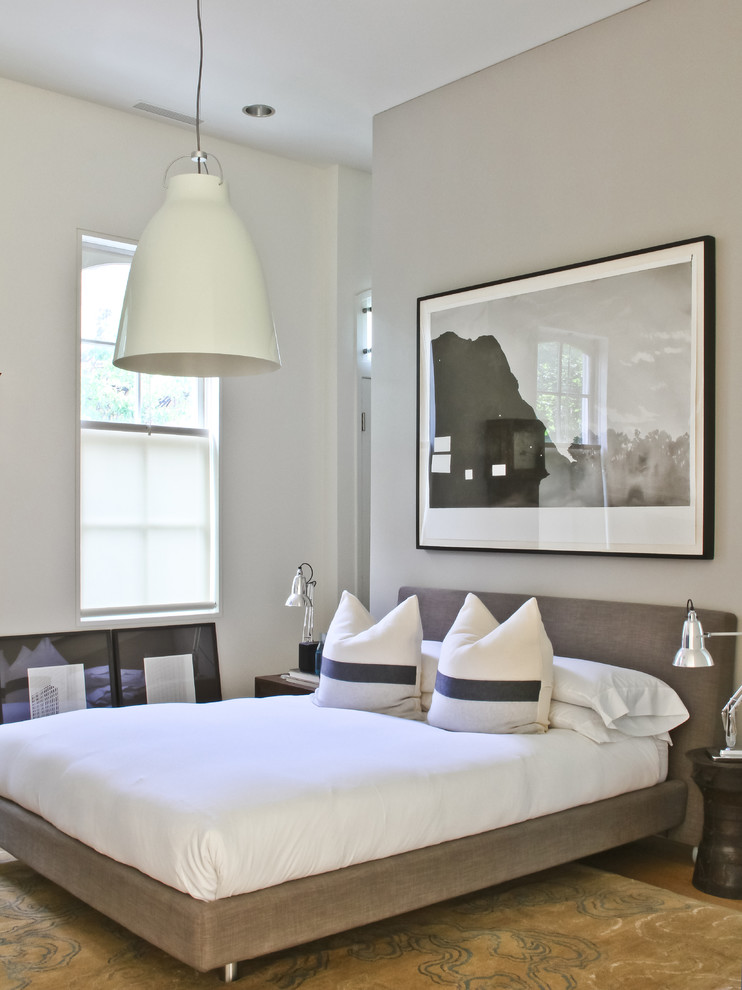 Inspiration for a contemporary bedroom remodel in Chicago with gray walls