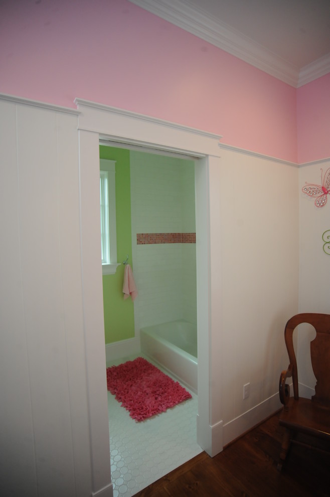 Bedroom - mid-sized country medium tone wood floor bedroom idea in Other with pink walls