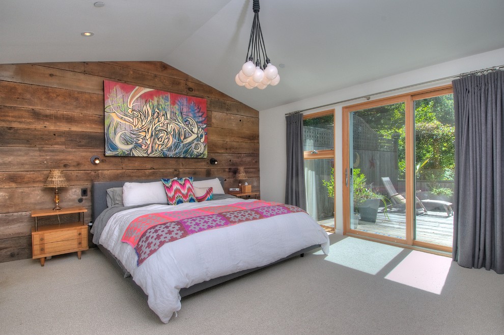 Example of a 1960s carpeted bedroom design in San Francisco with white walls