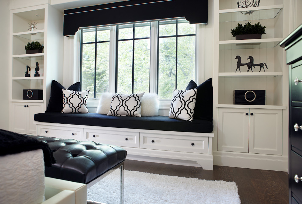 Inspiration for a large traditional guest bedroom in Toronto with white walls, dark hardwood flooring and no fireplace.