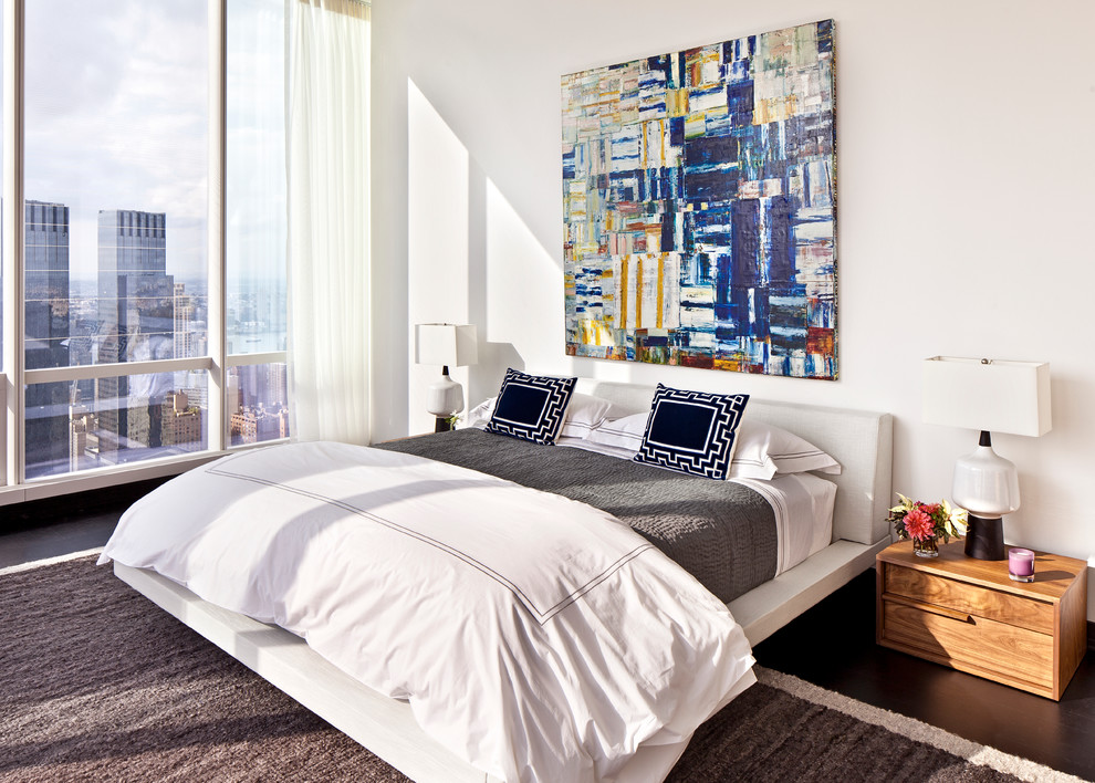 Inspiration for a contemporary master bedroom in New York with white walls.