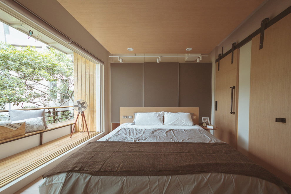 Idéer för industriella sovrum, med beige väggar