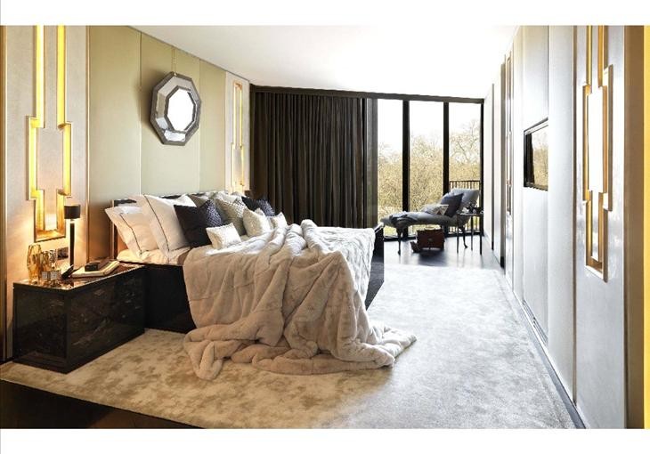 Example of a transitional bedroom design in London