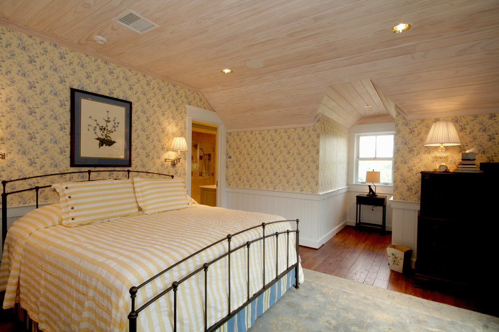 Example of a mid-sized farmhouse guest medium tone wood floor bedroom design in Richmond