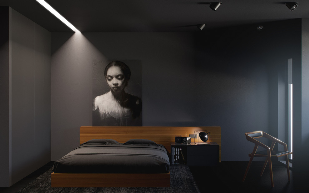 Cette image montre une chambre design de taille moyenne avec un mur noir et parquet foncé.