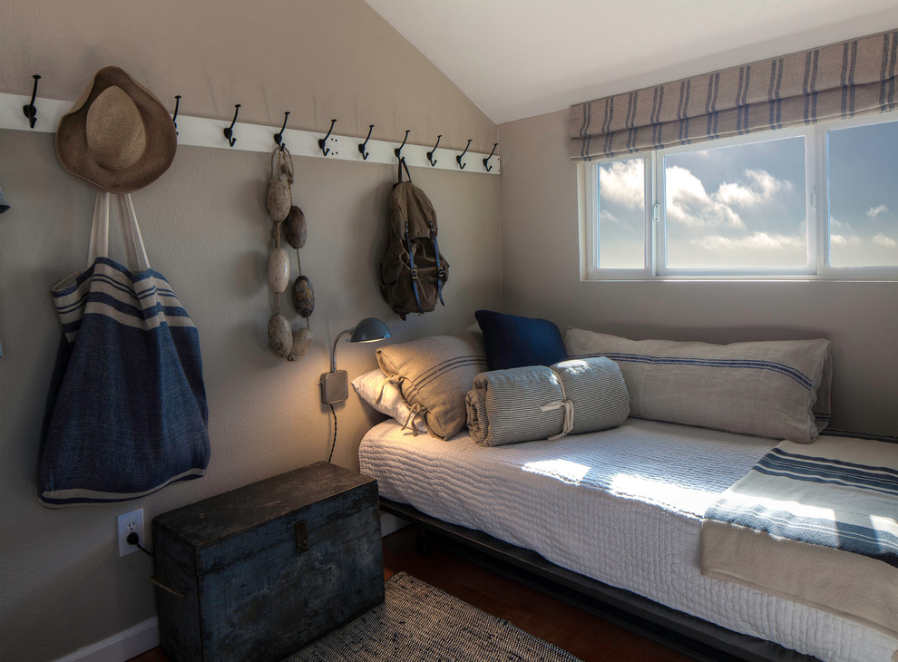 Inspiration for a coastal bedroom remodel in Seattle with gray walls