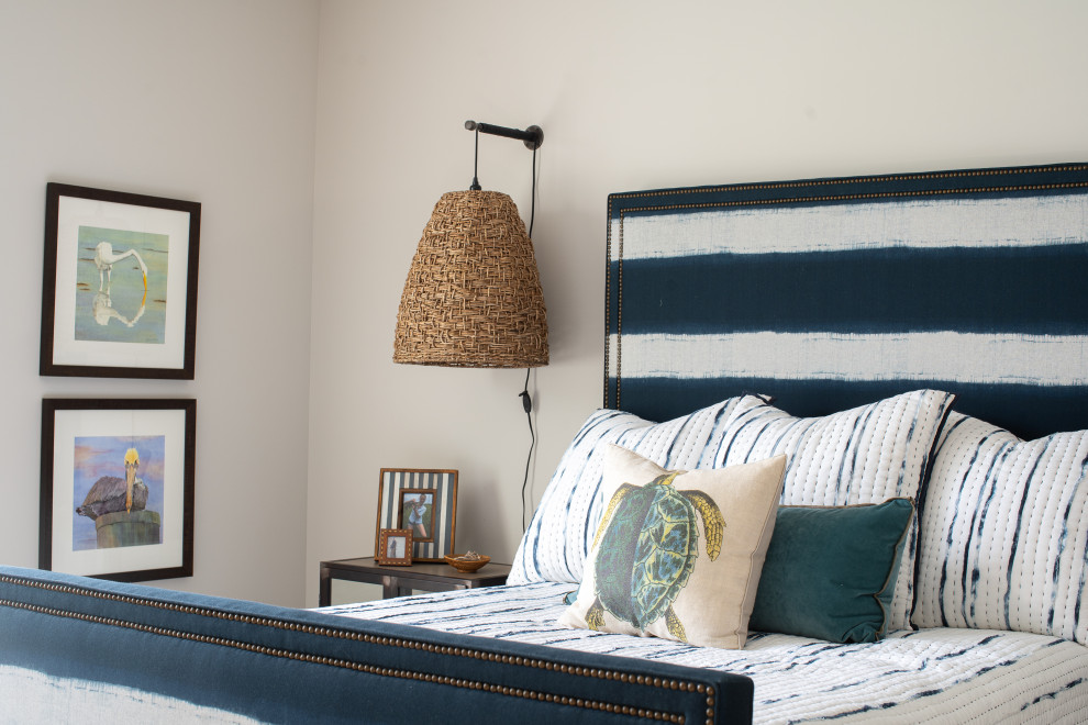 Inspiration for a coastal bedroom remodel in Minneapolis with white walls