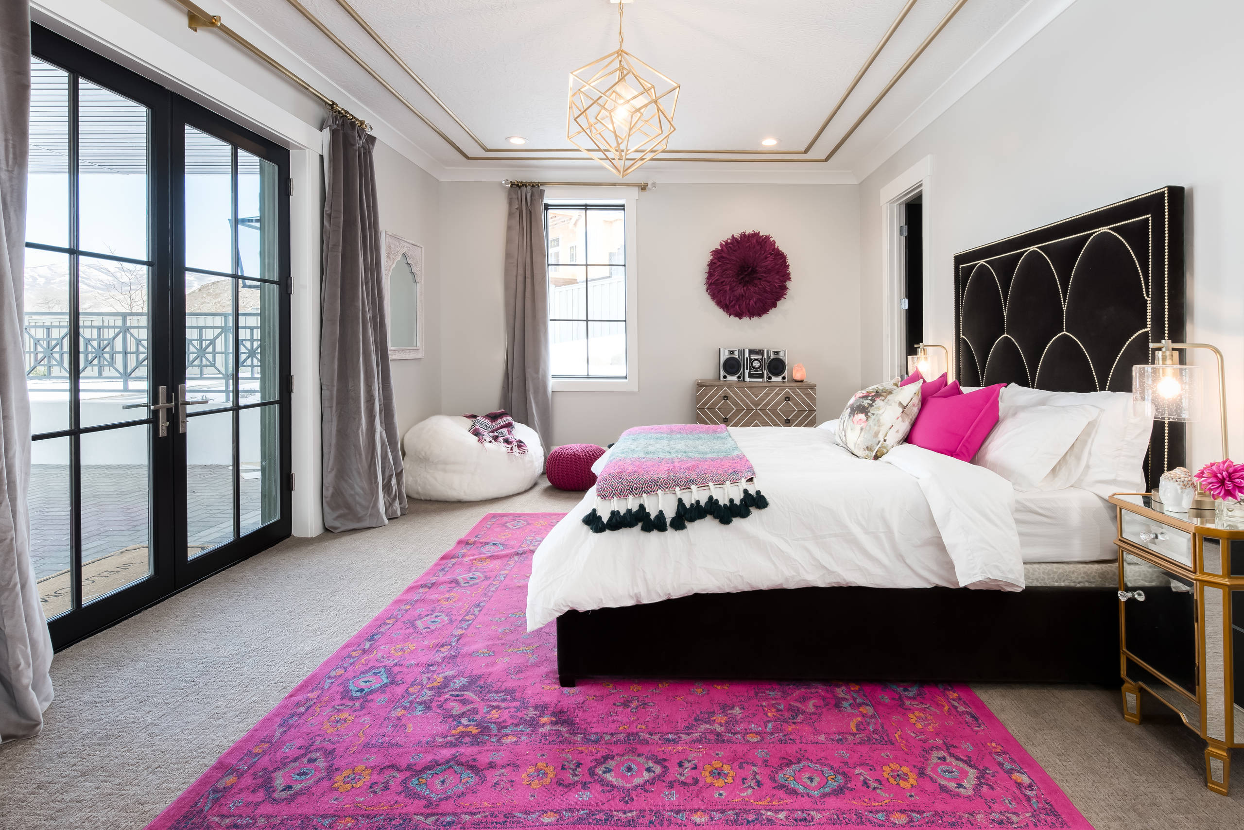 Black and pink walls in bedroom