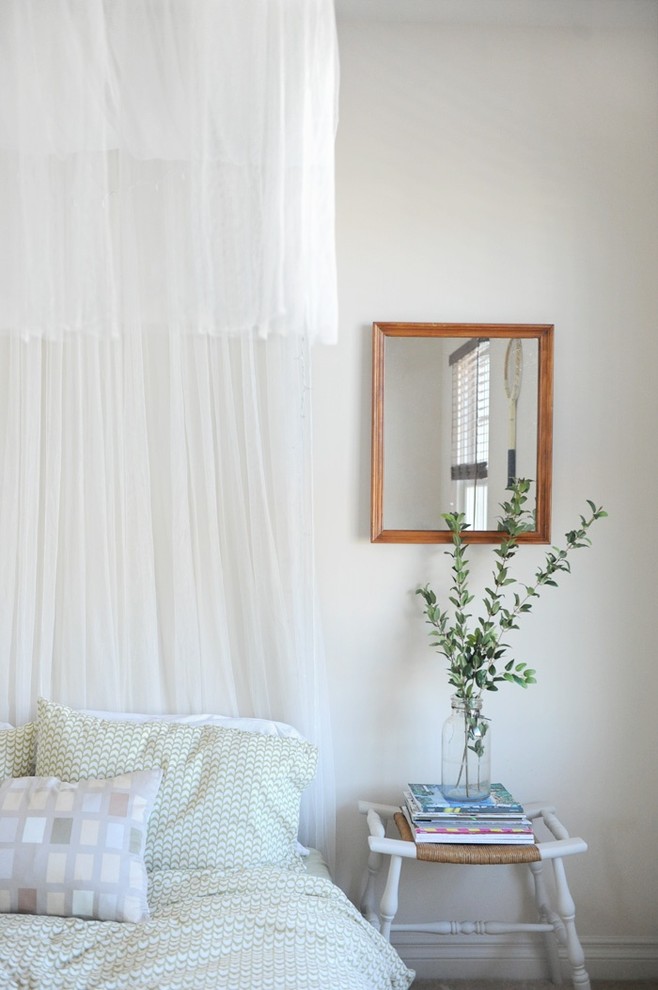 Example of an eclectic bedroom design in Other with white walls