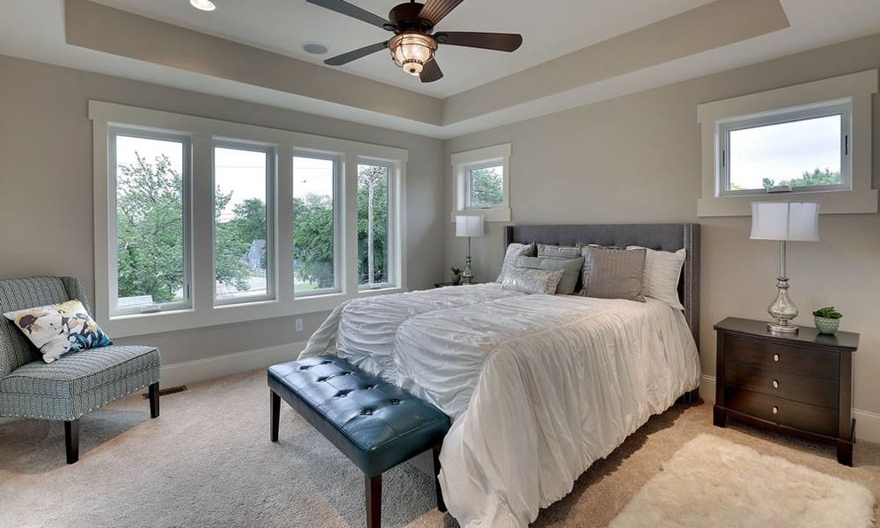 Example of a mid-sized transitional guest carpeted and beige floor bedroom design in Minneapolis with gray walls and no fireplace