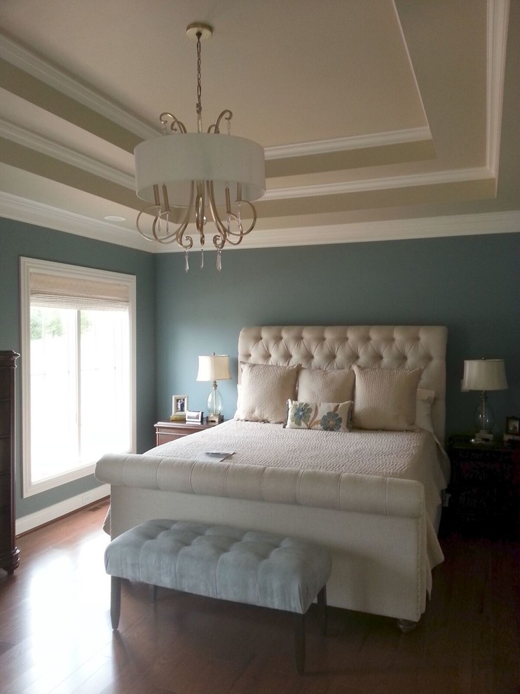Bedroom - large traditional master dark wood floor and brown floor bedroom idea in Other with no fireplace and gray walls