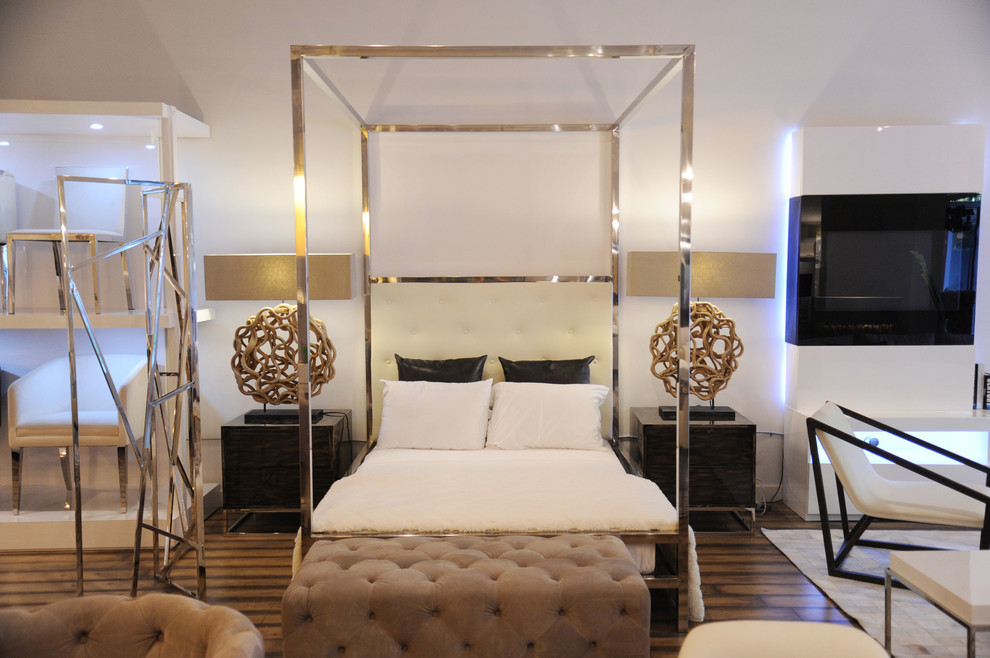 Diseño de habitación de invitados contemporánea con paredes blancas y suelo de madera oscura