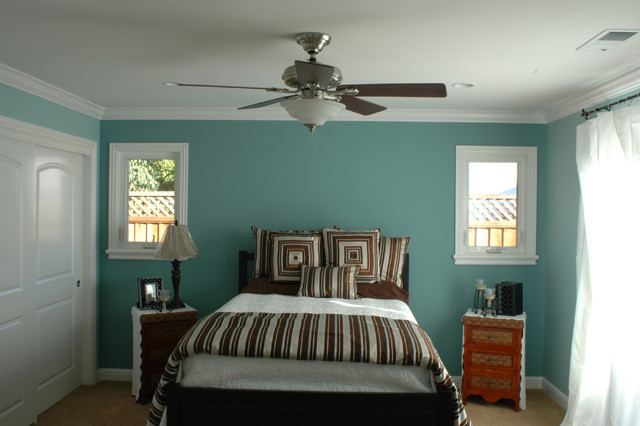 Medium sized traditional guest bedroom in San Francisco with blue walls and medium hardwood flooring.