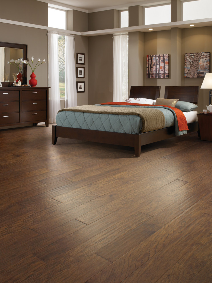 Inspiration for a large contemporary master dark wood floor bedroom remodel in Boise with gray walls and no fireplace
