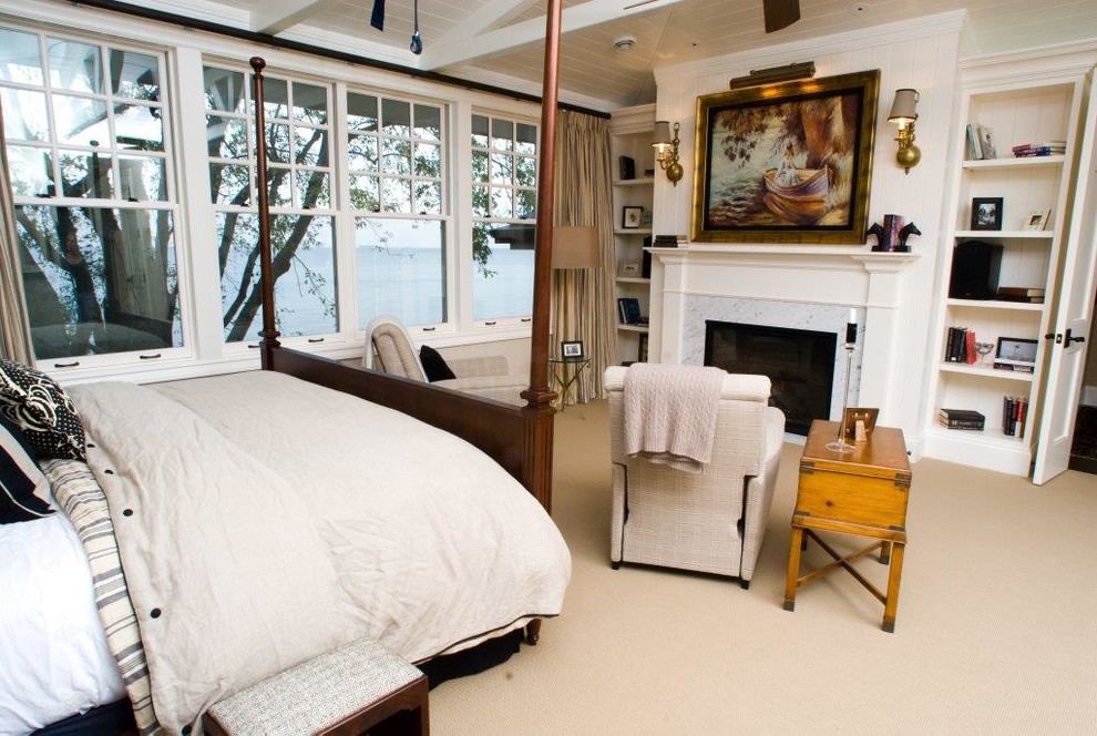 Example of a mid-sized classic master carpeted and beige floor bedroom design in Grand Rapids with white walls, a standard fireplace and a stone fireplace