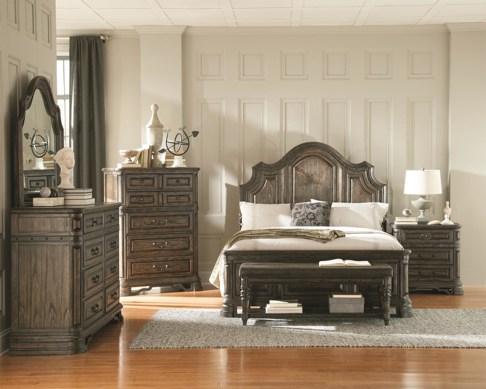 Mid-sized elegant master dark wood floor bedroom photo in Los Angeles with beige walls