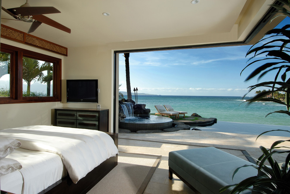 Photo of a world-inspired bedroom in Hawaii with beige walls.