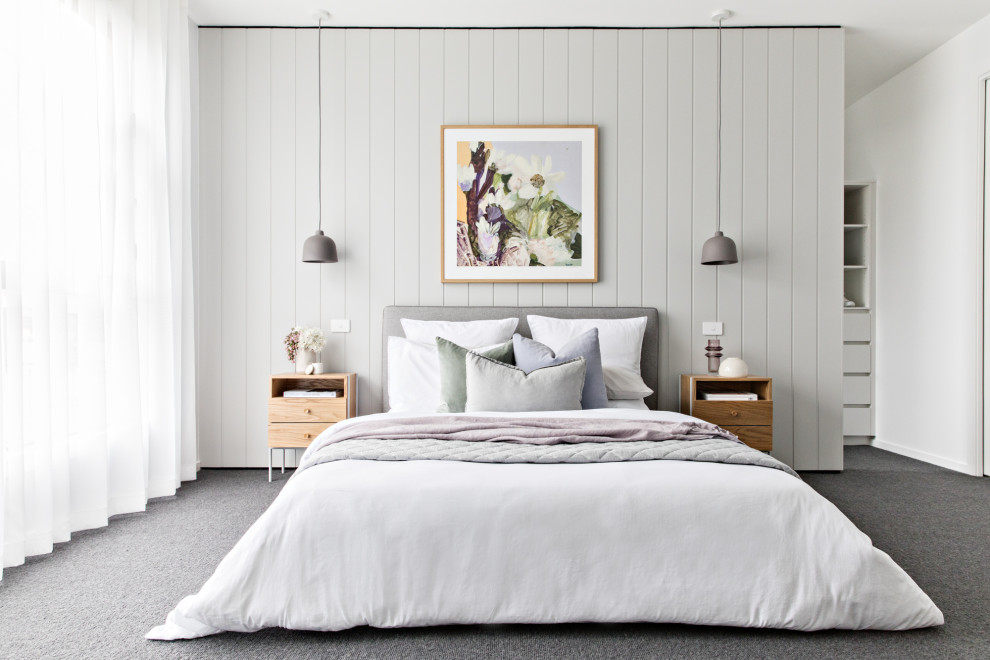 На фото: спальня в скандинавском стиле с серыми стенами, ковровым покрытием и серым полом