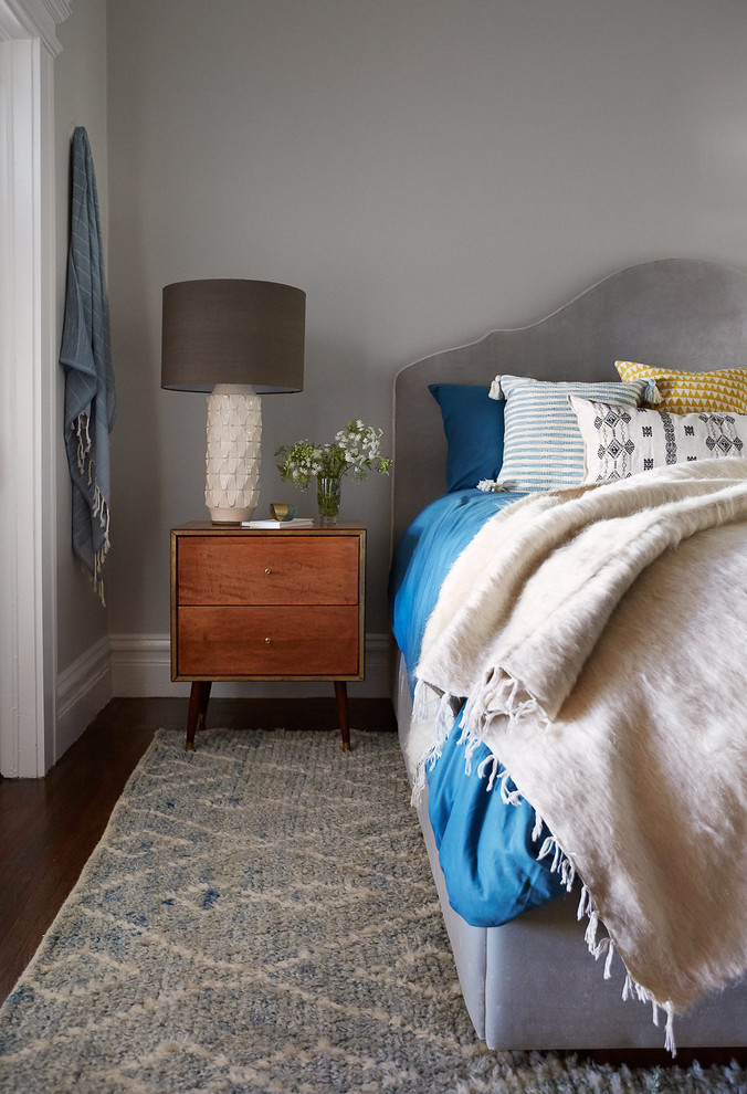 Transitional master dark wood floor bedroom photo in San Francisco with gray walls
