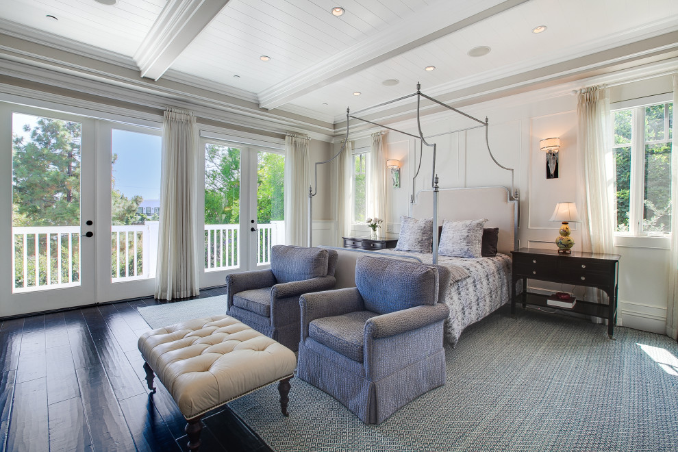 Design ideas for a coastal bedroom in Los Angeles with dark hardwood flooring, black floors, exposed beams, a timber clad ceiling and white walls.