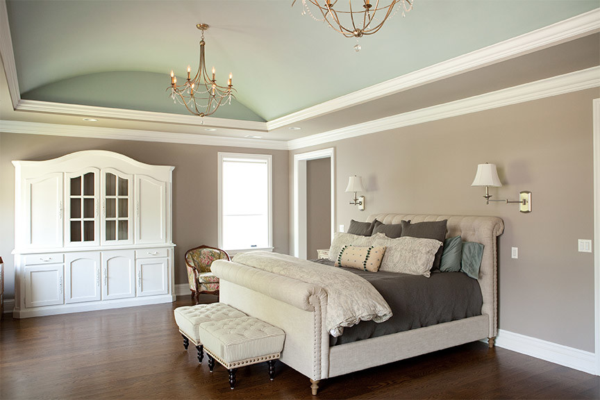 Elegant master brown floor bedroom photo in Chicago