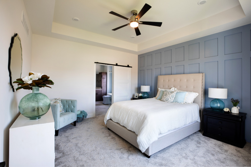 Inspiration for a large country master bedroom in Wichita with white walls, carpet, no fireplace, grey floors, a drop ceiling and a vaulted ceiling.