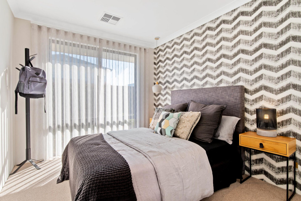 Bild på ett funkis sovrum, med flerfärgade väggar, heltäckningsmatta och grått golv