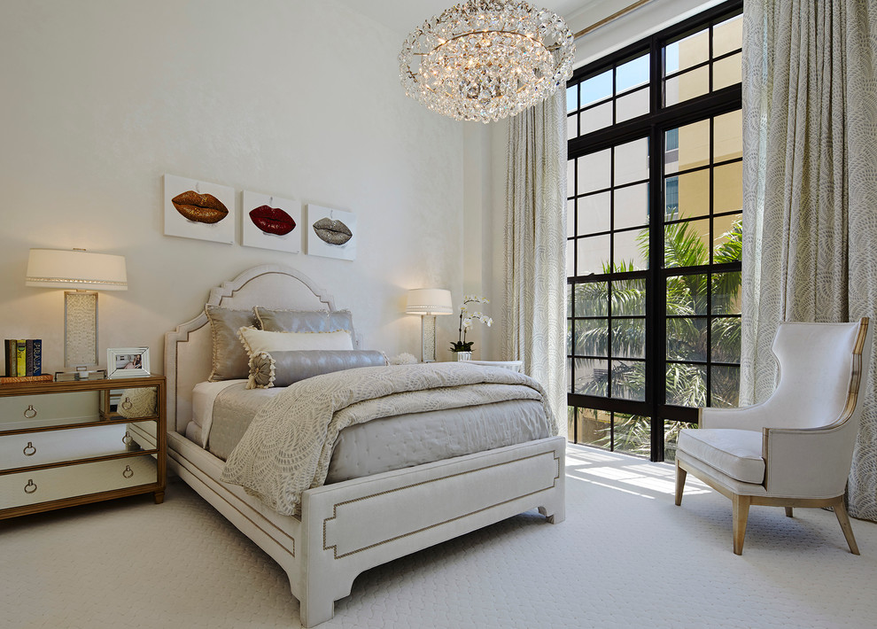 Inspiration for a contemporary master and grey and silver bedroom in Miami with white walls and carpet.