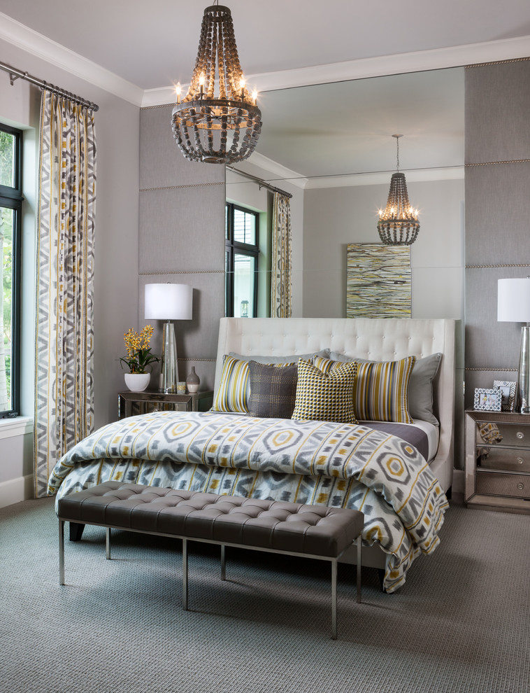 Classic guest bedroom in Miami with grey walls, carpet and grey floors.