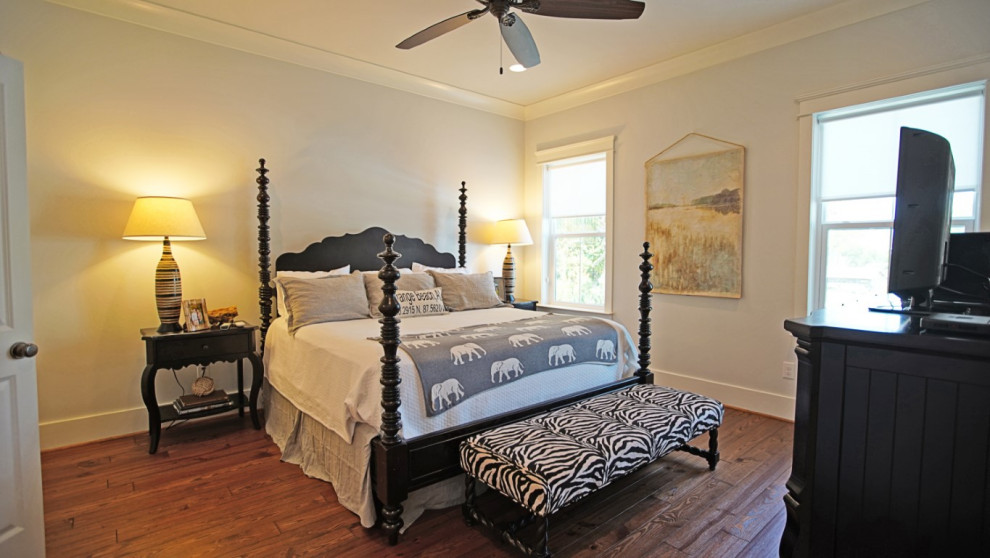 Design ideas for a traditional master bedroom in Other with white walls, medium hardwood flooring and blue floors.