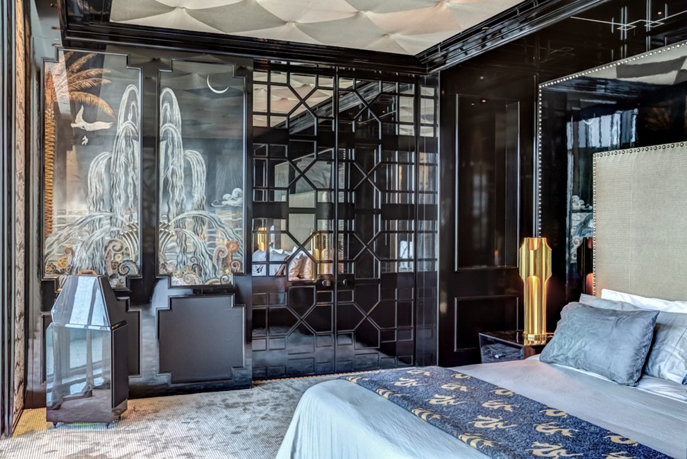 На фото: большая хозяйская спальня в современном стиле с черными стенами и ковровым покрытием без камина с