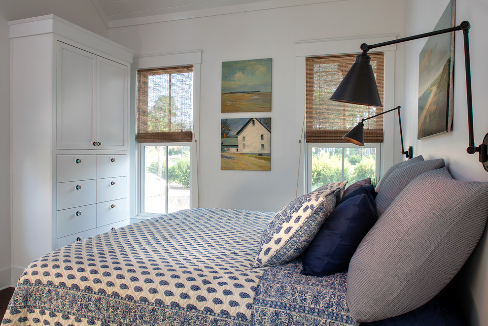 Small farmhouse master light wood floor bedroom photo in Charleston with white walls
